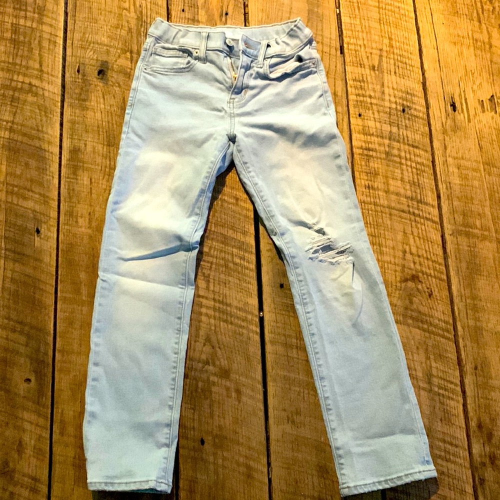 Girls size 10 Old Navy distressed jeans. Slim cut. Adjustable waist. Karate.